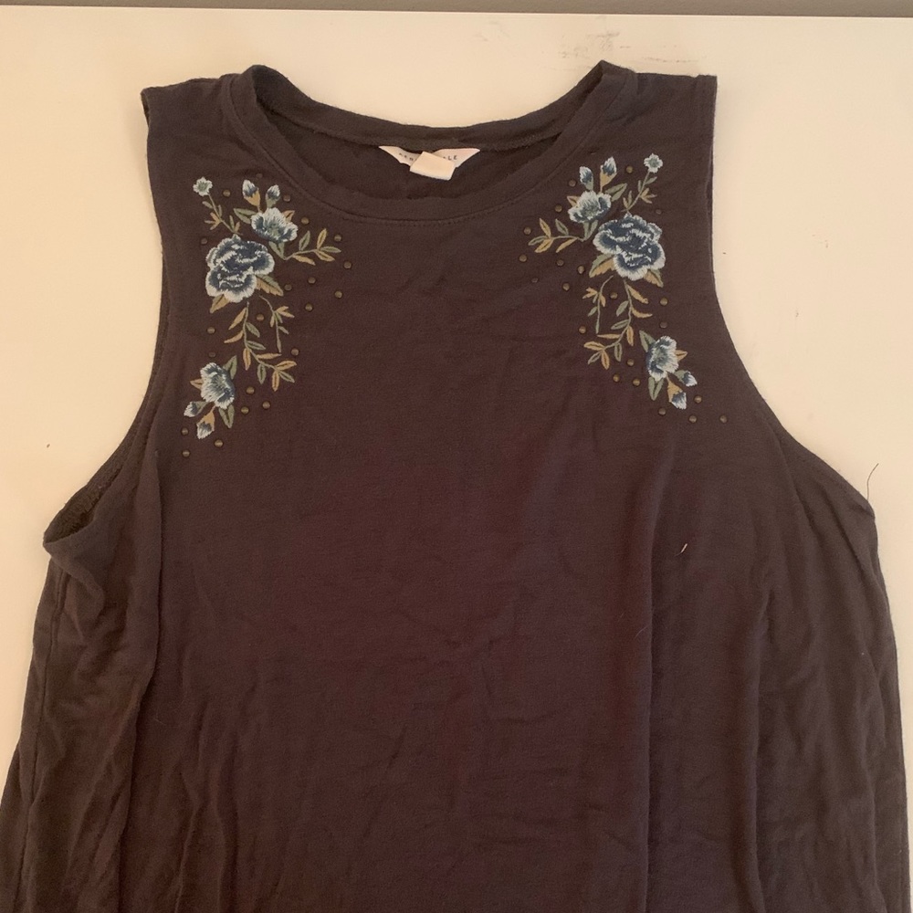 Soft grey tank top with floral embellishments